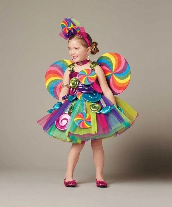 girl with blonde hair, dressed as candy, tulle skirt, halloween costume ideas for girls, colorful costume
