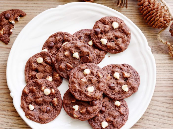 cocoa cookies, with white chocolate chips, homemade chocolate chip cookies, white plate, wooden table