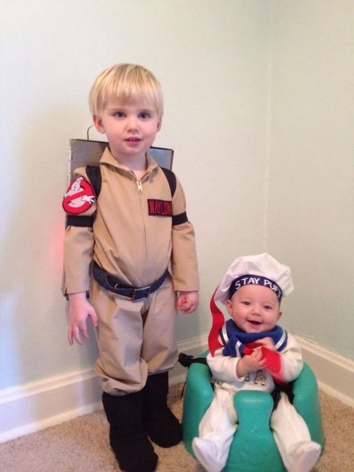 boy dressed as a character from ghostbusters, baby dressed as marshmallow man, superhero costumes for kids