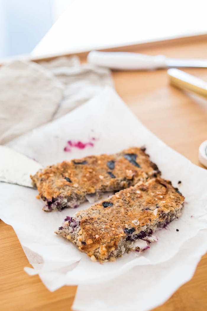 blueberry bars, on white baking paper, keto breakfast no eggs, wooden table