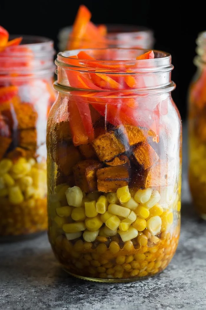 lentils and corn, sweet potato and peppers, inside a mason jar, how to meal prep, granite countertop