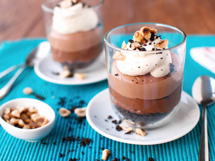 chocolate mousse, in a glass, on a white plate, simple dessert recipes, blue table cloth