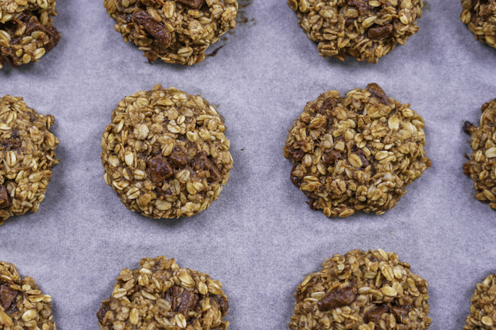 oatmeal cookies, with raisins, chocolate chip cookie recipe, arranged on a white baking paper