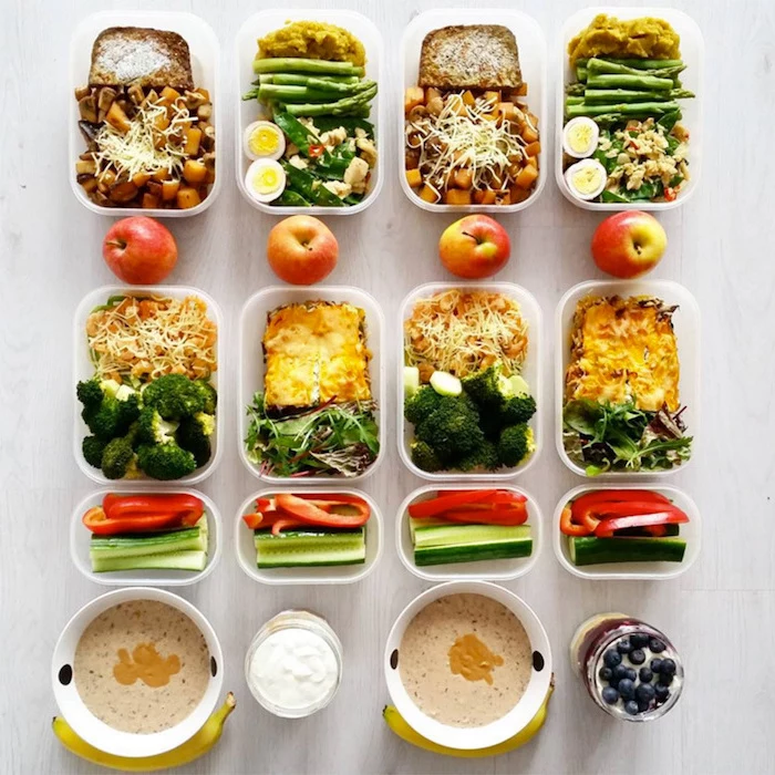 different meals, inside plastic containers, healthy meal prep ideas for the week, sliced vegetables, granola and yoghurt