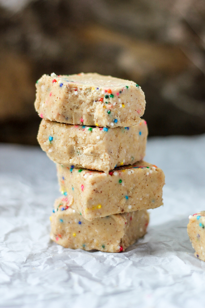 protein bars, with sprinkles, mothers day desserts, one on top of the other, white baking paper