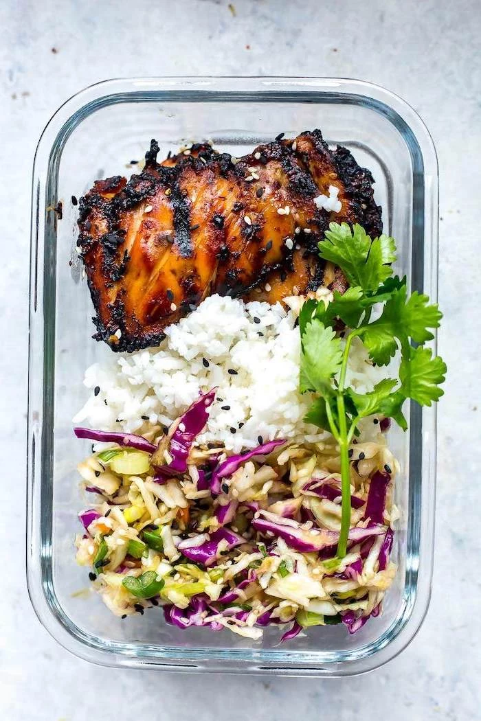 glass container, meal prep recipes chicken, rice and parsley, cabbage salad, sesame seeds
