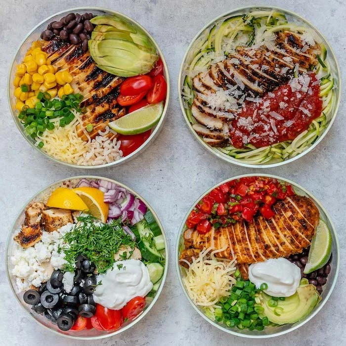 meal prep recipes chicken, four glass bowls, filled with different meals, chicken fillet, chopped vegetables