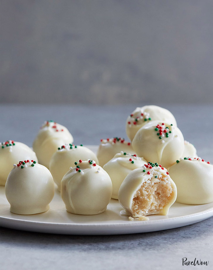 white chocolate, cake pops, sprinkles on top, on a white plate, easy dessert recipes, white background