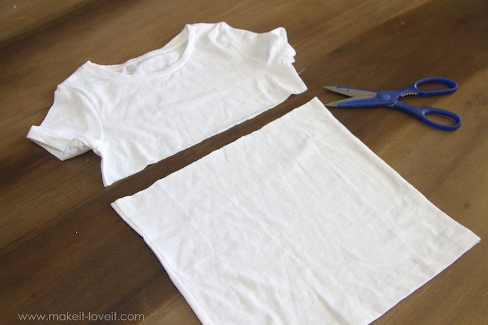 white t shirt, cut in half, with blue scissors, on wooden table, step by step, diy tutorial, best halloween costumes
