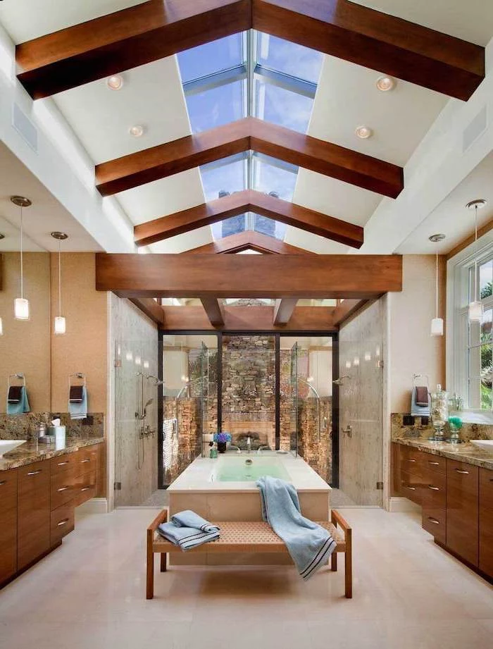 skylights and wooden beams, cathedral ceiling, master bathroom, wooden cupboards, tiled floor