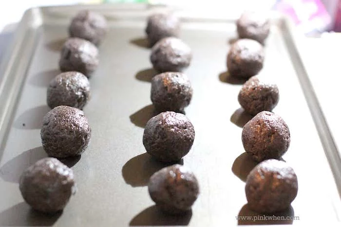 oreo cookie balls, arranged on silver tray, thanksgiving desserts ideas, blurred background