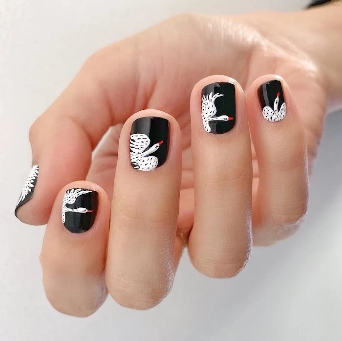 black nail polish, white storks, nail decorations, short squoval nails, white background, fall nail colors