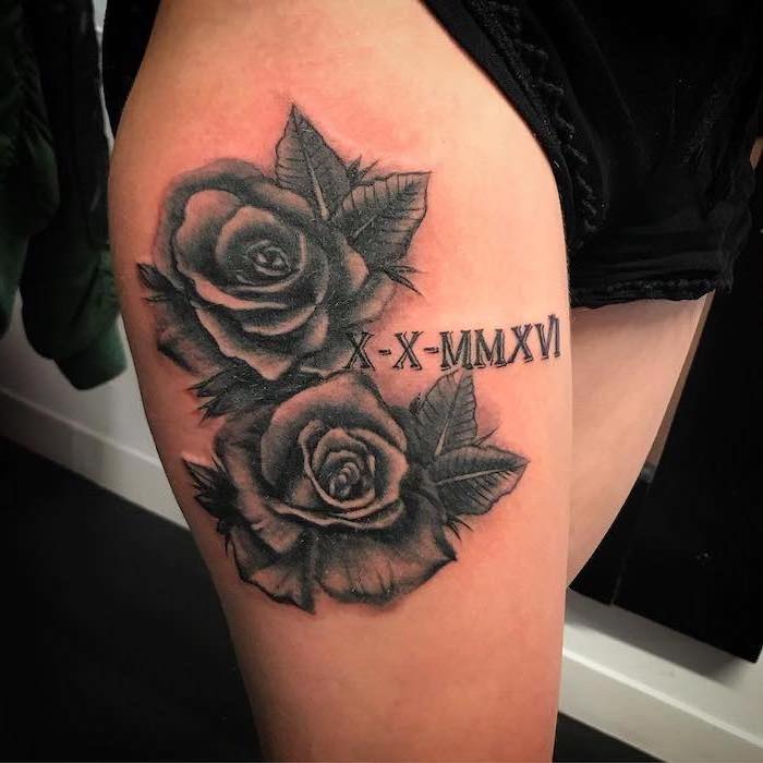 roman numerals, two roses, tattoo designs for women, black shorts, black floor, white wall