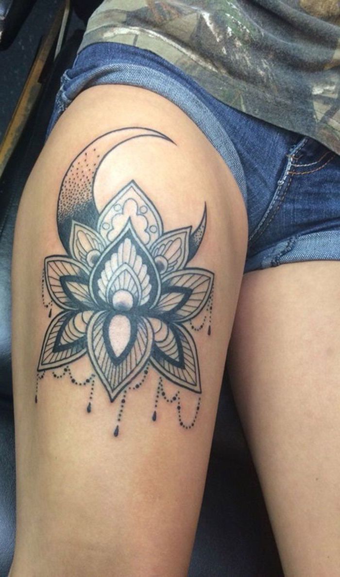 denim shorts, mandala flower tattoo, crescent moon, green top, thigh tattoos