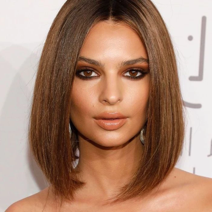 emily ratajkowski looking at the camera, brown straight hair, medium length hairstyles, white backgroundd