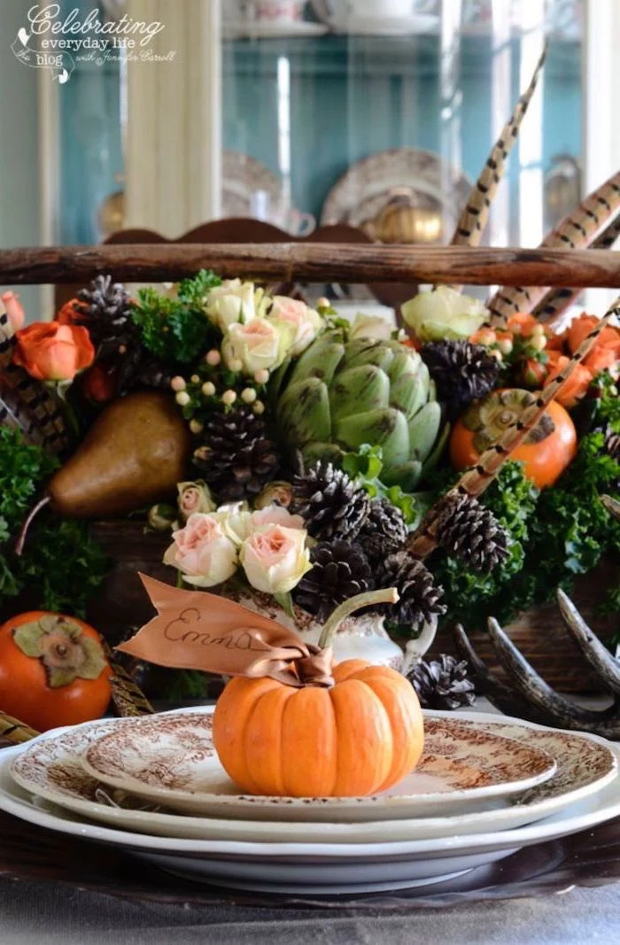 emma table setting, autumn decor, flower arrangement, in the middle of the table, with roses, pine cones