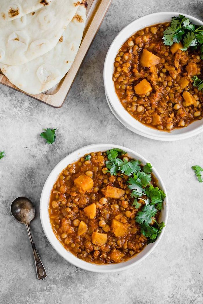 pita on wooden tray, white bowls, best weight loss diet, butternut squash, lentil stew