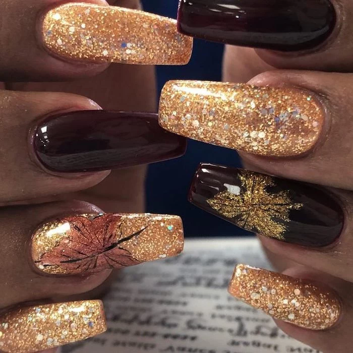 burgundy red, gold glitter, nail polish, 2019 nail trends, fall leaves, nail decorations, long squoval nails