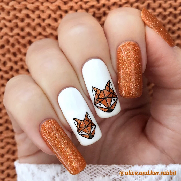 orange glitter, white nail polish, glitter foxes, nail decorations, fall nail ideas, long squoval nails