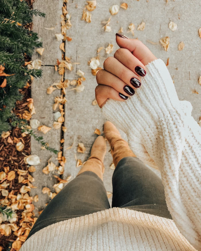 black and white, red marble, nail polish, fall nail ideas, white sweater, beige velvet boors, fall leaves