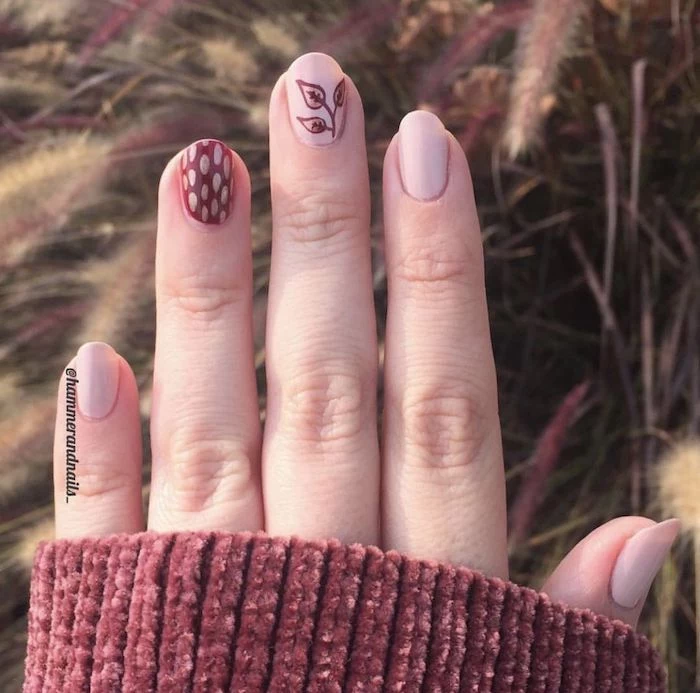 short almond nails, nude nail polish, autumn nails, leaves on a branch, nail decorations, red velvet sweater