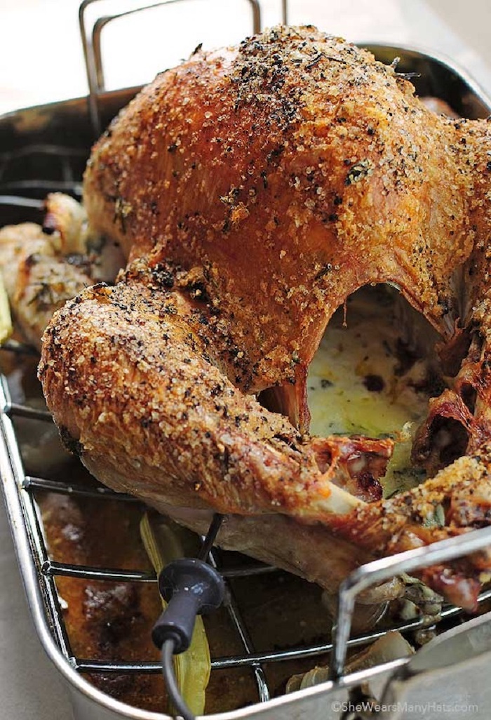 roasted turkey, stuffed with mayonnaise and herbs, herbs on top, how long does it take to cook a turkey