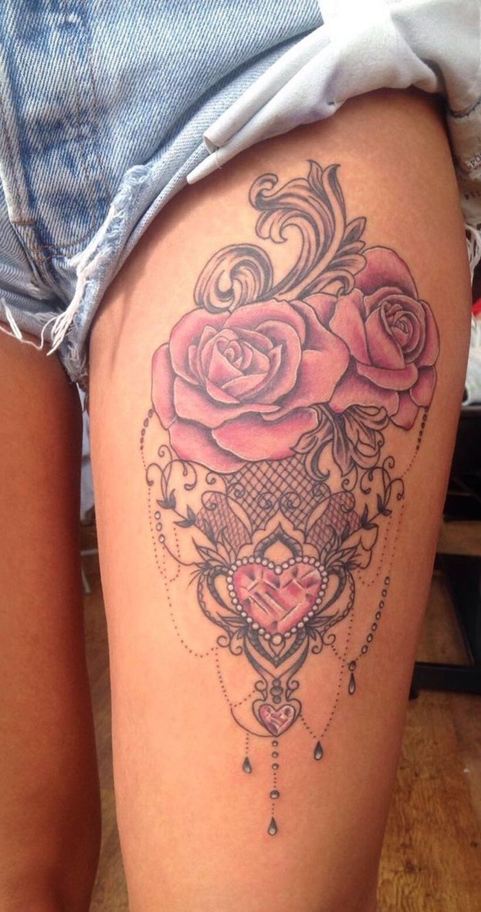 rose outer thigh tattoos