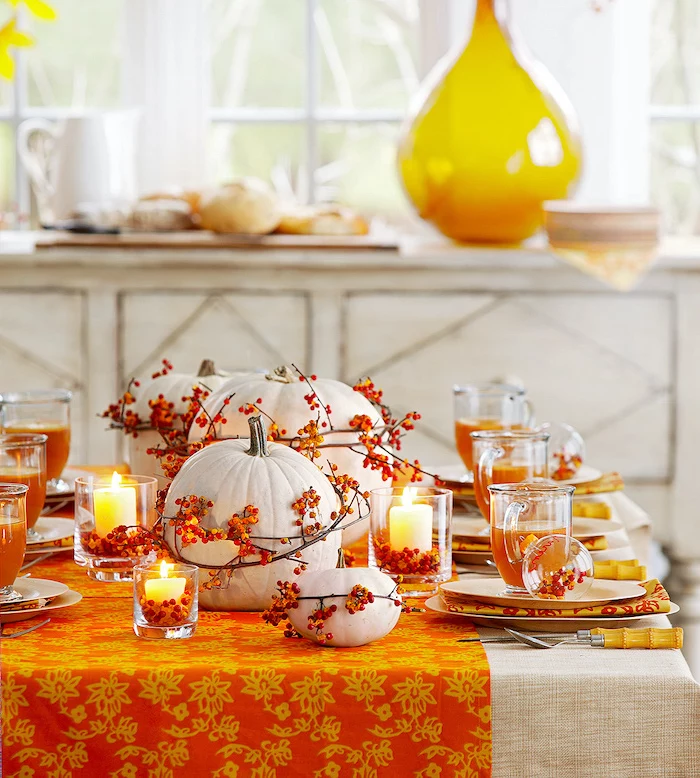 thanksgiving door decor, orange table runner, white pumpkins, pinterest thanksgiving, plate settings, candles inside vases