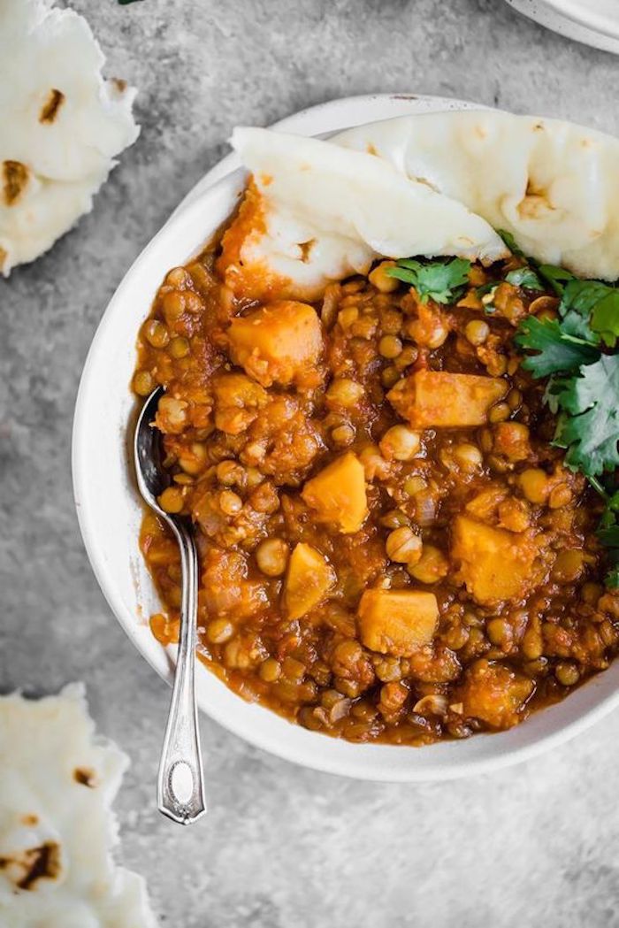 pita on the side, white bowl, butternut squash, lentil stew, best weight loss diet, parsley garnish