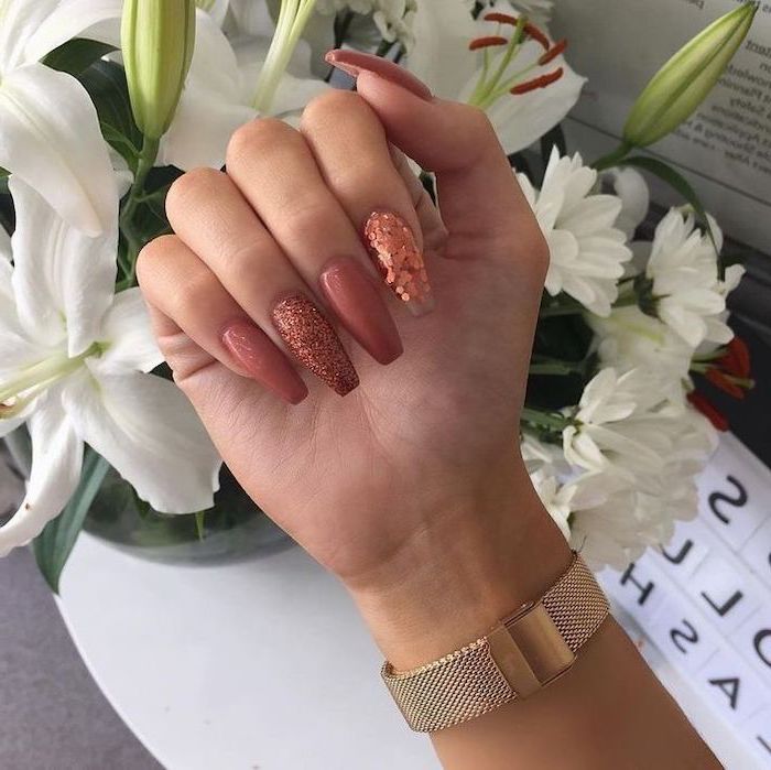 burnt orange nails, dark pink, pink glitter, nail polish, long coffin nails, white flower bouquet, gold watch