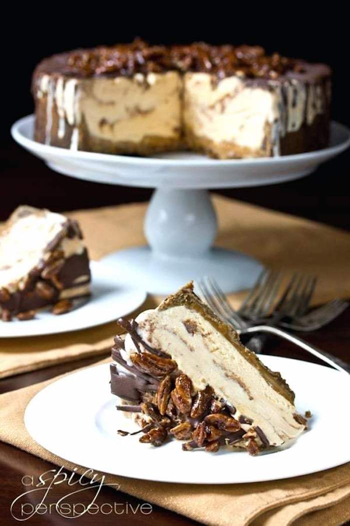 white cake stand, white plate, thanksgiving dessert recipes, ice cream cake, slice of cake, chocolate and walnuts on top