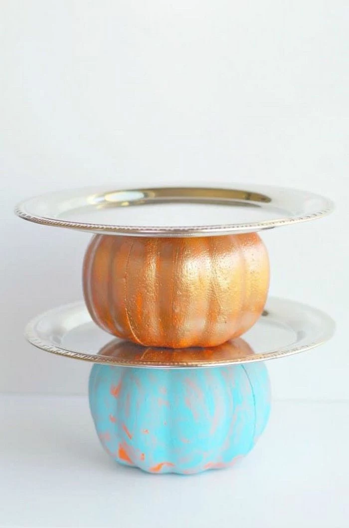 diy tutorial, step by step, pumpkins painted in gold and blue, silver trays attached, thanksgiving decorating ideas,