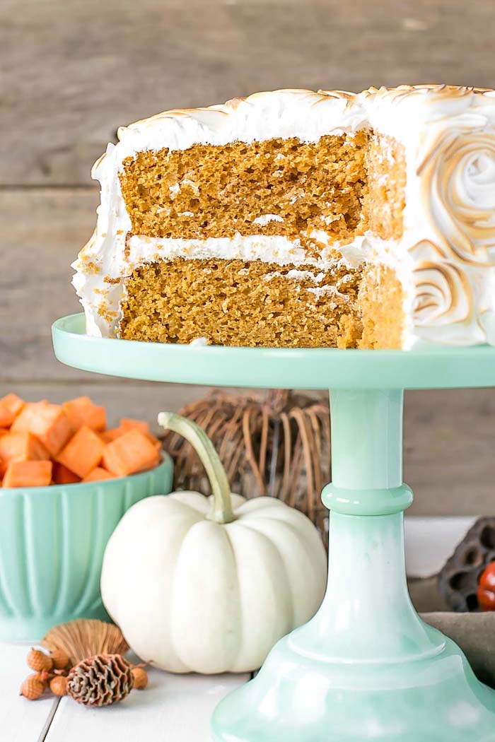 thanksgiving desserts, turquoise cake stand, sweet potato cake, roasted marshmallow fluff on top, wooden table