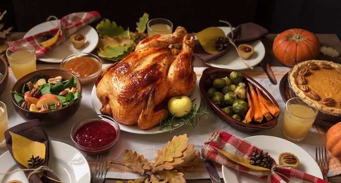 different meals, best thanksgiving turkey recipe, pecan pie, white table runner, roasted turkey, white plates
