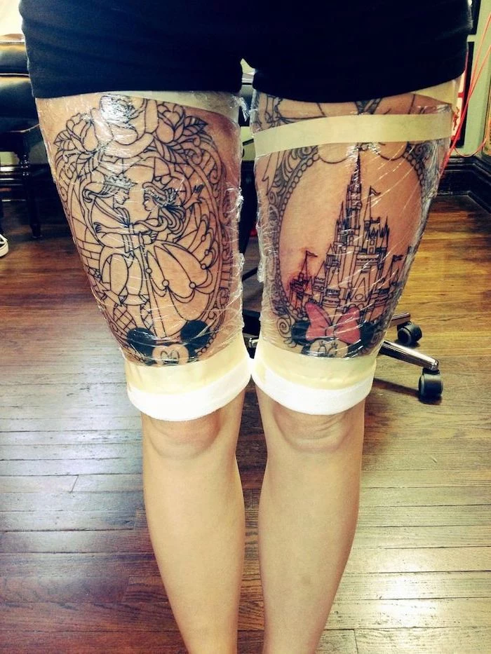beauty and the beast, disney castle, tattoos on both legs, wooden floor, lion thigh tattoo, disney inspired