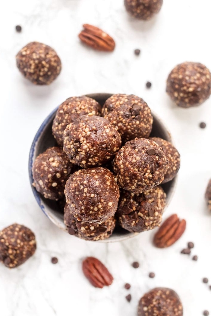 walnuts scattered on the table, protein ball recipe, chocolate truffles, in a bowl