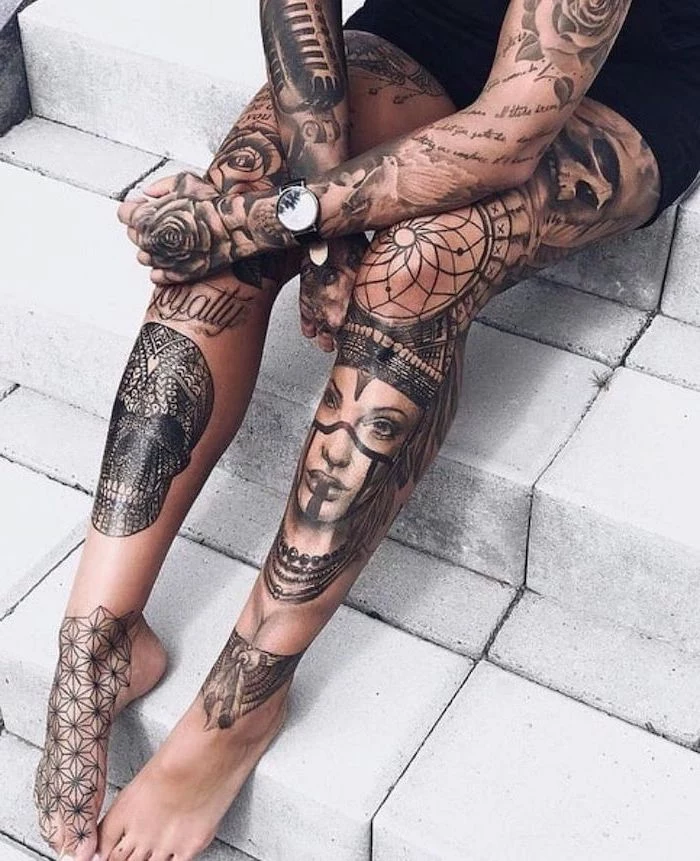 woman sitting on stairs, whole legs tattoos, sleeve tattoos, black dress, cute thigh tattoos