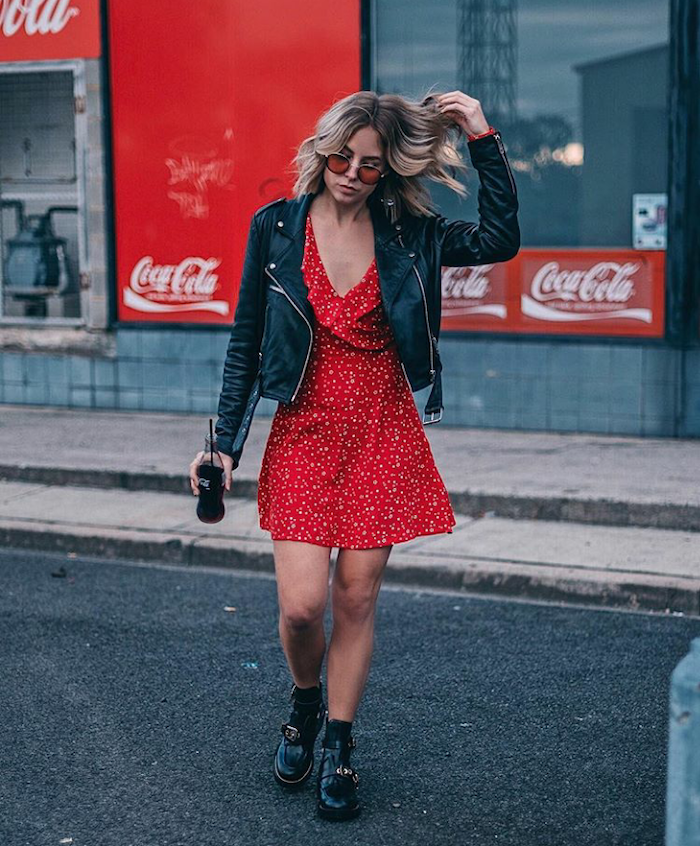 medium length hairstyles with bangs, woman walking down the street, wearing red dress, black leather jacket