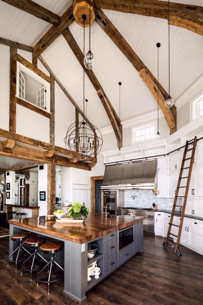 what does vaulted mean, wooden beams, wooden floor, kitchen island, wooden ladder, white walls
