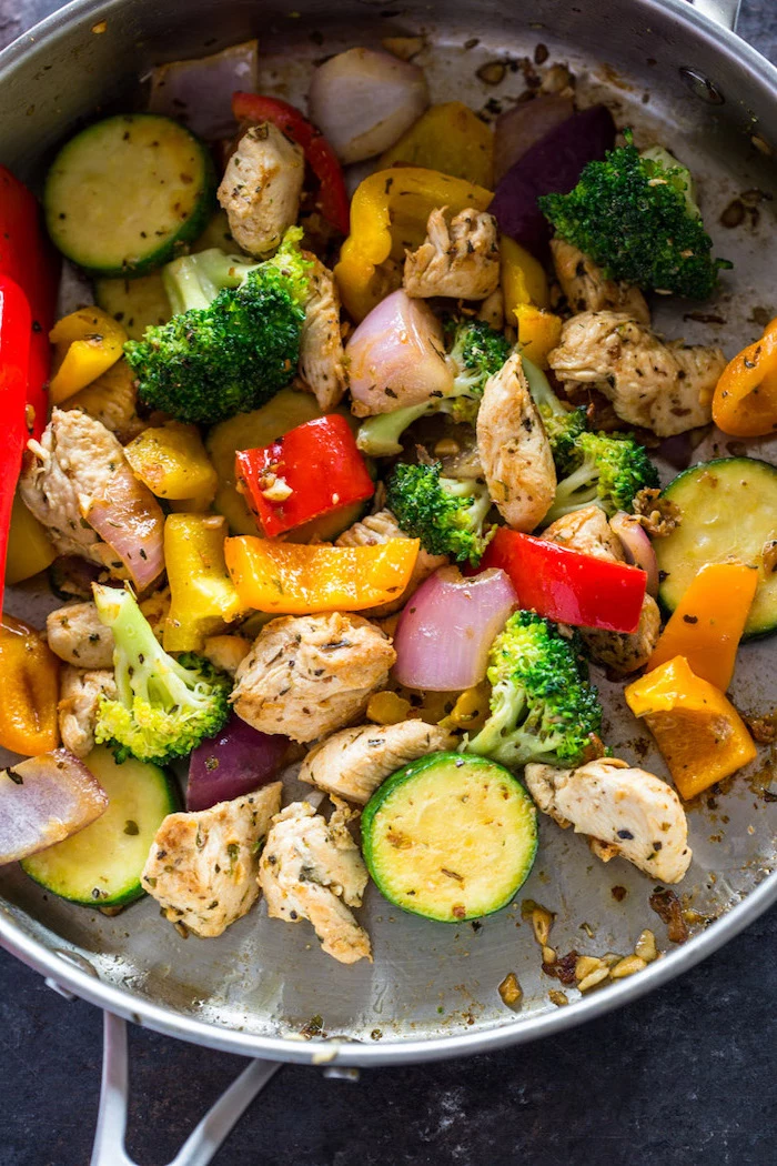 zucchini burritos, chicken and broccoli, chopped peppers, foods to avoid to lose weight, in a skillet