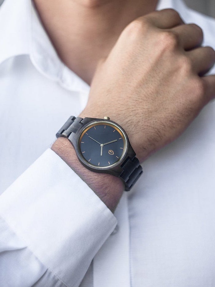 man wearing a white shirt, watch with black straps on the wrist, gift ideas for men