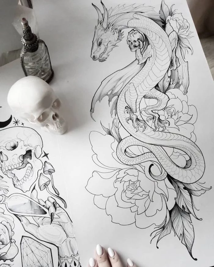 large dragon intertwined with roses, holding a skull, black and white pencil sketch, dragon back tattoo, white background