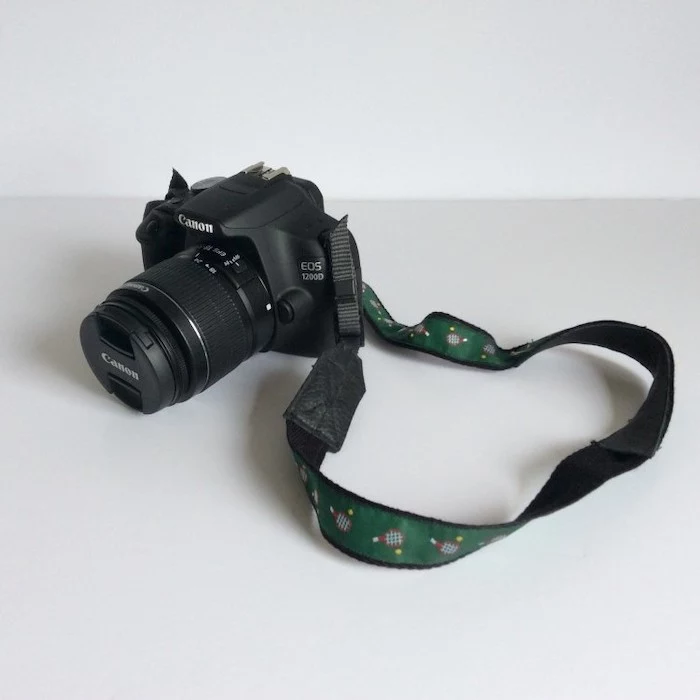 step by step diy tutorial, camera strap for a canon photo camera, gift ideas for men, placed on wooden surface