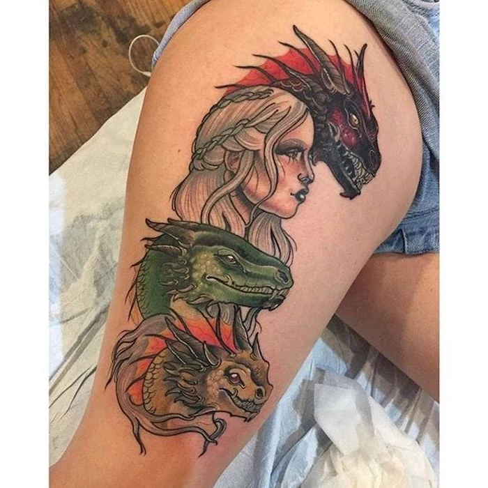 daenerys targaryen with drogon, viserion and rheagal, game of thrones characters, dragon back tattoo, thigh tattoo