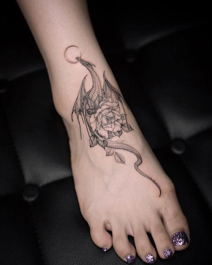 dragon looking at the moon, peony flower, japanese tattoo meanings, woman with purple glitter nail polish, leg tattoo