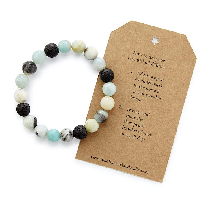 essential oil diffusing bracelet, card with the instructions on the side, white background, what to get your mom for christmas