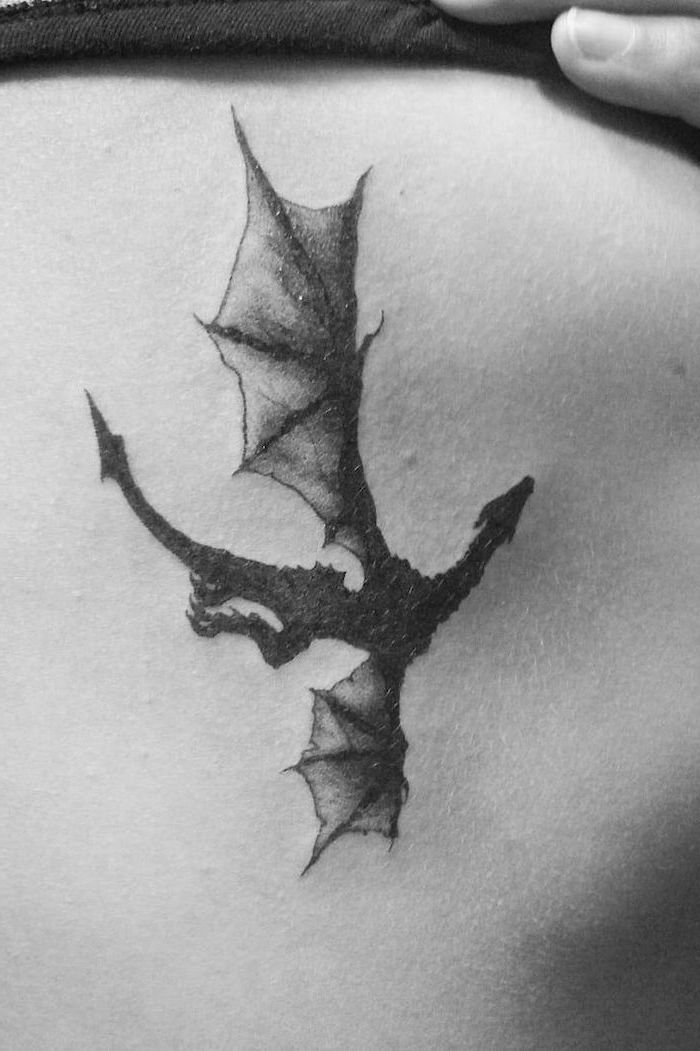 flying dragon, drogon from game of thrones tattoo, dragon arm tattoo, black and white photo