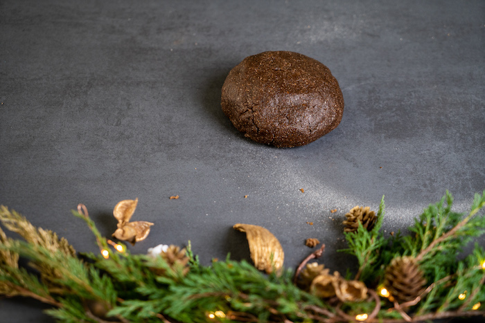 gingerbread cookies dough, placed on lightly floured black surface, decorating gingerbread cookies