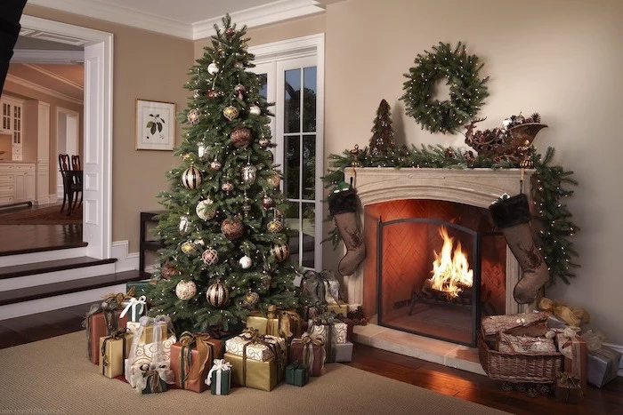 tree next to a fireplace, surrounded by wrapped presents, decorated with red and gold ornaments, how to put ribbon on a christmas tree