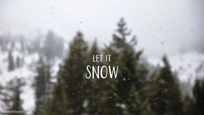 let it snow written over forest landscape, winter desktop backgrounds, tall trees in the background, snow falling